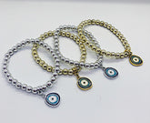 Gold And Silver Evil Eye Bracket