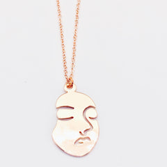 Long Gold Face Necklace
