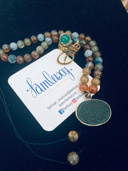 Calligraphy necklace with jade stones