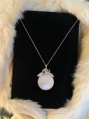 Circular oyster medal