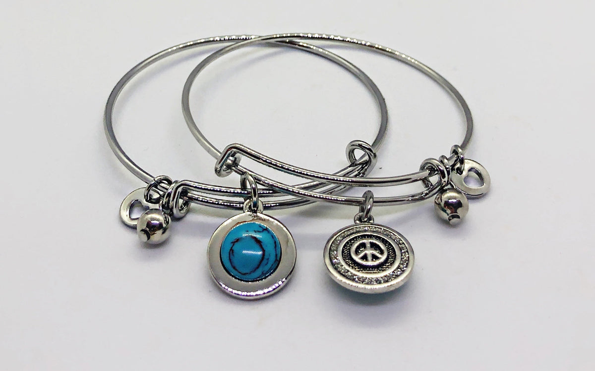 Silver double side bangle with blue stone
