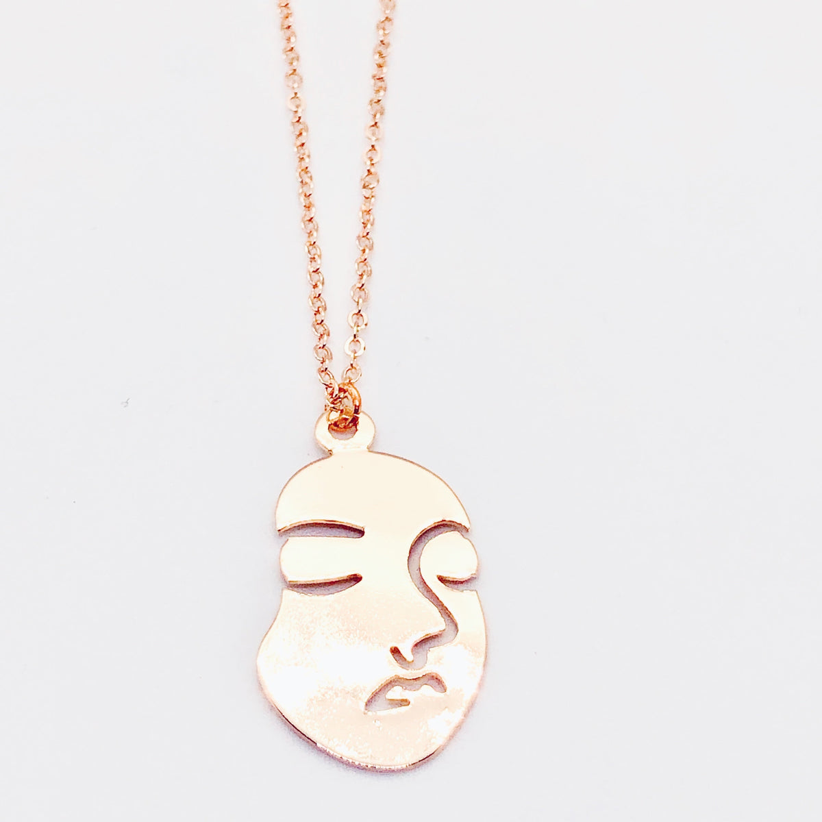 Long Gold Face Necklace