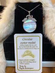Circular oyster medal