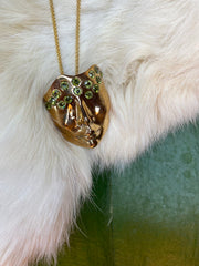 Gold plated face necklace